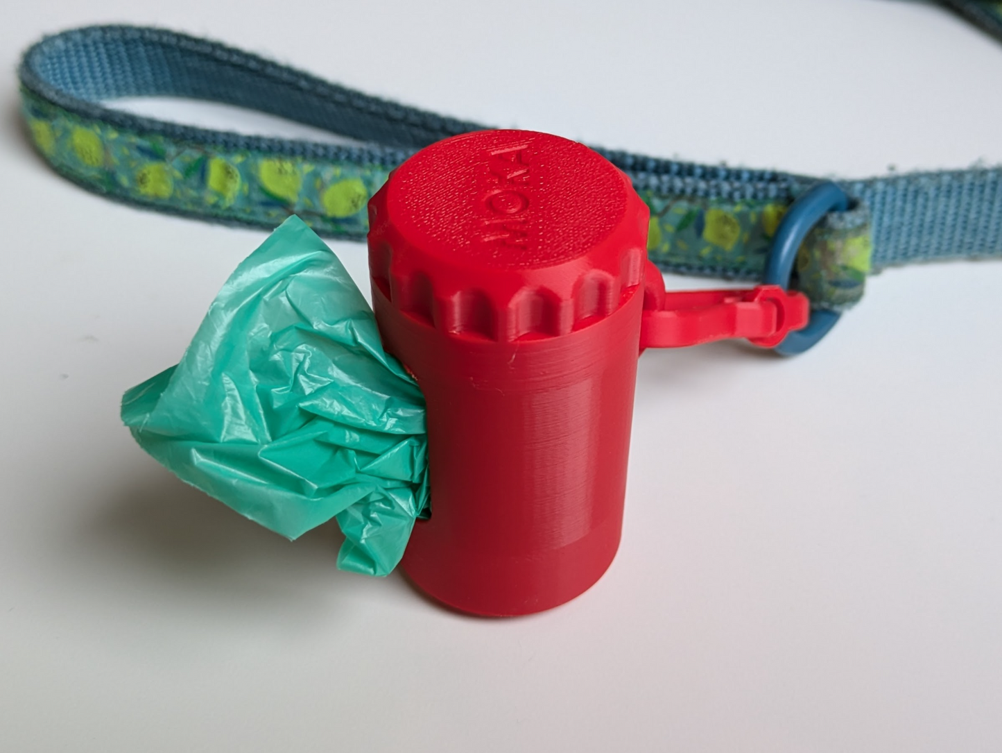Dog poop bag holder and dispenser