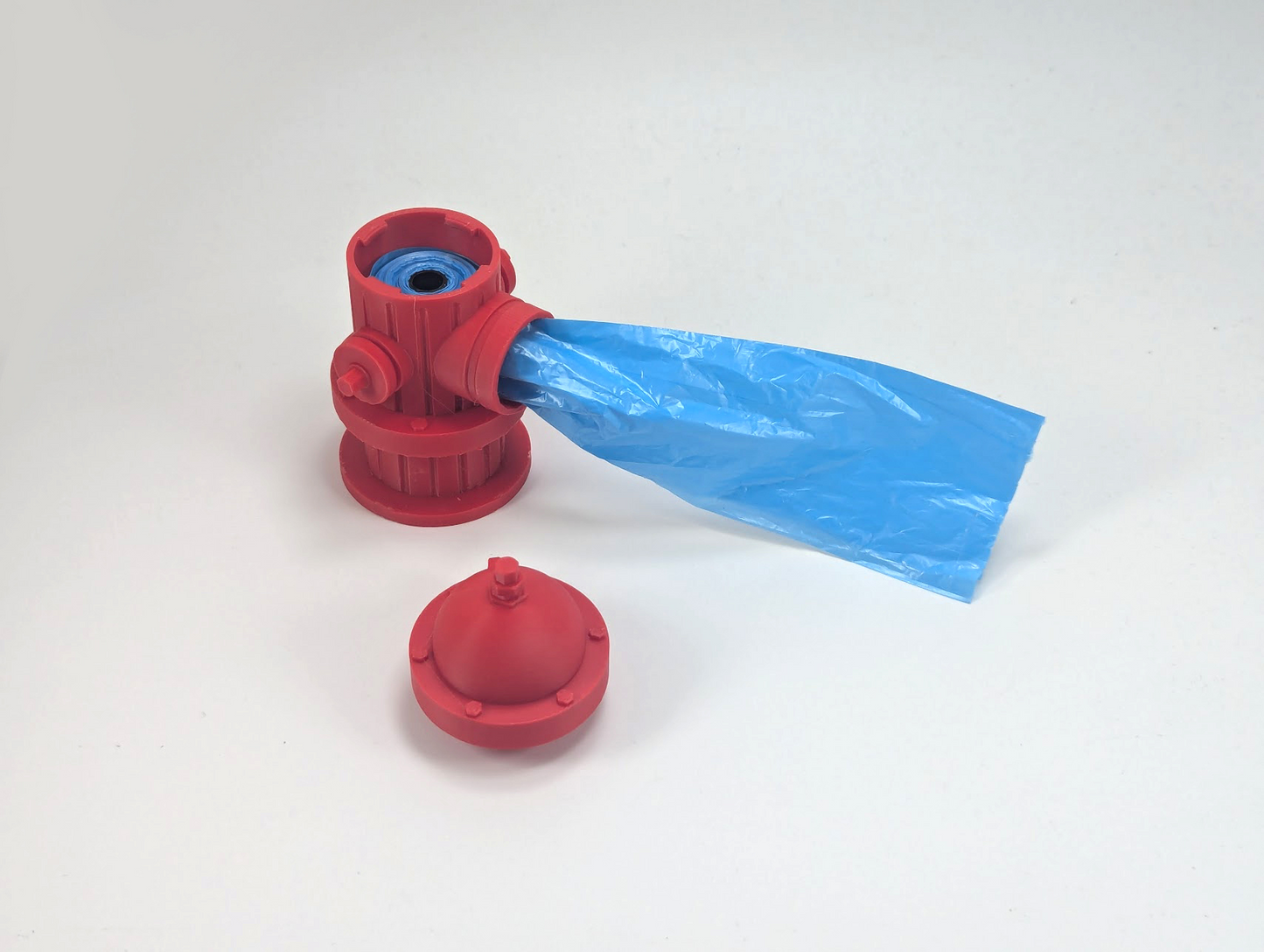 Doggie poop bag holder that looks like a fire hydrant